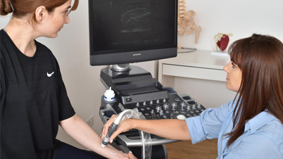 Home Page 3 Physiotherapist - female Physiotherapist treating a young female patient